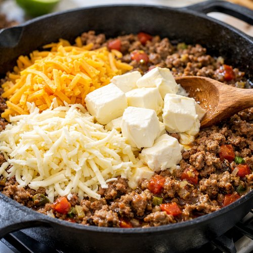Step 4: Add the Cheese and Begin the Gentle Melt