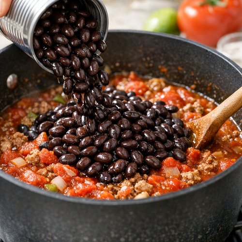 Step 4: Add the Beans and Tomatoes
